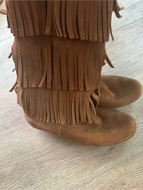 Minnetonka Fringed Suede Knee-High Boots in Chestnut Brown
